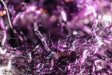 Close up of purple fabric fibers of a scarf . High quality photo