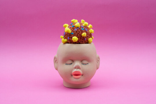 surreal advertising image head with coronavirus