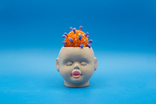surreal advertising head with coronavirus