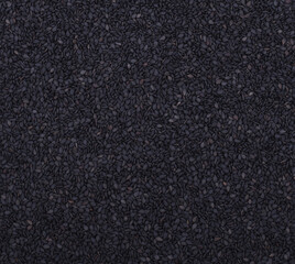 Pile of organic black sesame seeds isolated on white background