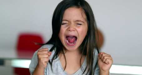 Upset little girl yelling feeling angry - Powered by Adobe