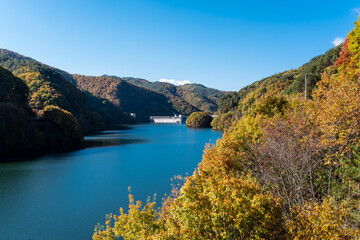 The scenery of the dam lake. It is a scenic autumn landscape.It is Lake Minowa in Nagano Prefecture, Japan.