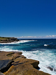 Stunning view of a deep blue sea from a coastal trail lookout, Sydney, New South Wales, Australia
