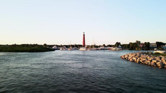 Drone shot of Ponce Inlet Lighthouse in Florida at sunset