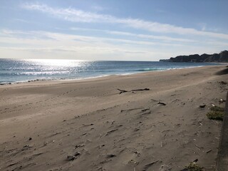 Hebara Beach in Katsuura, Chiba, Japan during the winter months, the Pacific Ocean is very blue with a nice clean white sand beach. There are no people on this stunning coastline due to Covid in 2020