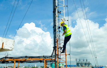 Engineer or Technician wear safety equipment climb high telecom tower for maintenance work,working high risk, Installation and Preventive maintenance on telecommunication network 