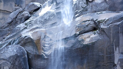 icicles on the rocks and waterfall