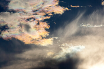 the expressive contrast of the clouds in the sky