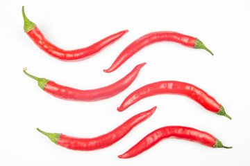 Red hot chili peppers on a white background. food figures. Vitamin vegetable food