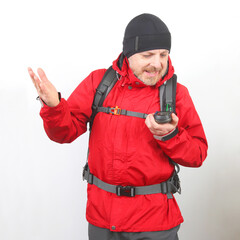 happy tourist in red jacket with navigator on white background