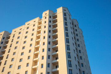 Facade of a new multi-story residential building. architecture and modern construction