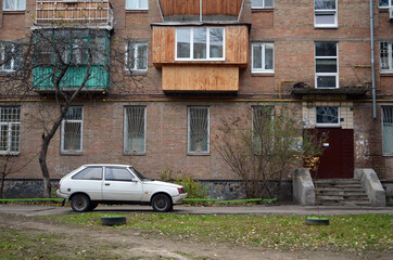 Fototapeta na wymiar Modern ghetto. Bad district. Residential area in Kiev at autumn. Exterior. Ukraine