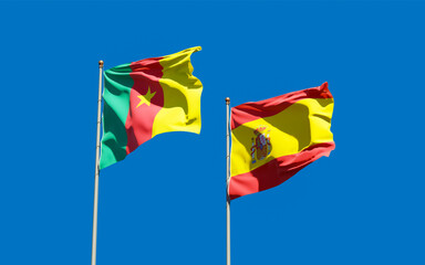Flags of Spain and Cameroon.