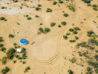 Obraz premium Water well in the desert or steppe. Place to turn the water delivery vehicle