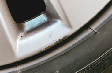 Scratches on the gray alloy wheels of the car