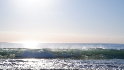 Fototapeta na wymiar Pacific Ocean waves and sunlights