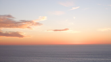 Naklejka na ściany i meble Pacific ocean and sunset