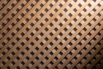 Texture of decorative wooden lattice with colored background