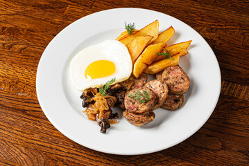 breakfast with fried egg and sausage