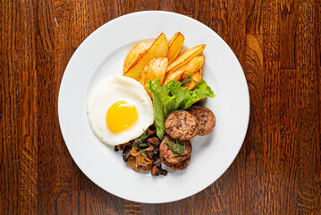 breakfast with fried egg and sausage