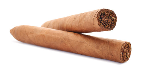 A pair of cuban handmade cigars torpedo isolated on white