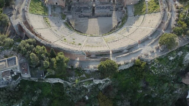 Taormina city in Sicily, Italy. Top view of the city with the Greek theater.