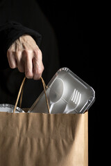 Unrecognizable woman with take away food bags