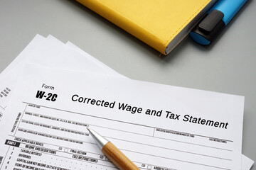  Financial concept about Form W-2C Corrected Wage and Tax Statement with phrase on the piece of paper.