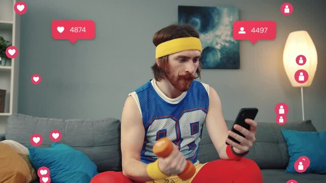 Caucasian comical retro stylish sportsman sitting on couch training with dumbbells and checking social media user interface on smartphone. Animated icons.