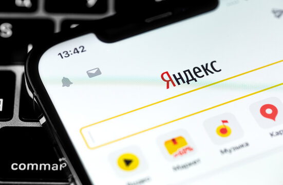 Yandex mobile app on the screen smartphone. Yandex is a Russian multinational company in the information technology industry. Moscow, Russia - November 28, 2020