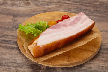 Smoked pork breast with salad leaves