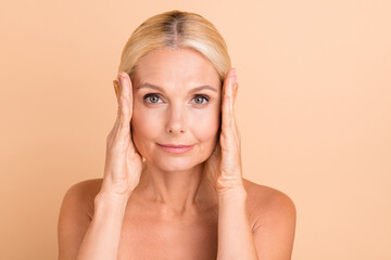 Photo of beauty uplift concept aged lady naked shoulders touch eye line uplift tightening isolated...