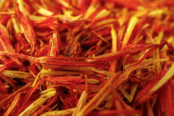 Saffron spice on wooden table macro photo