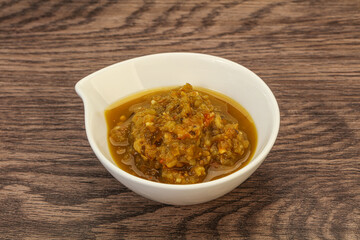 Green spicy sauce in the bowl