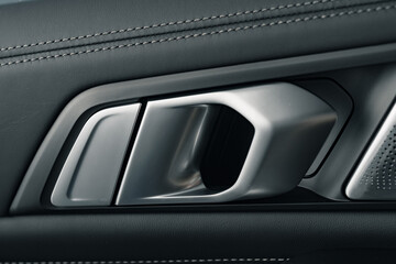 Modern luxury car door handle close up