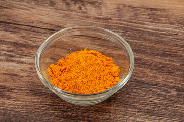 Tumeric powder in the bowl