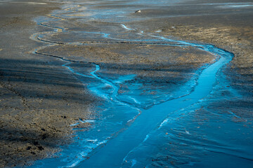 Bend of the stream on a flat plane.