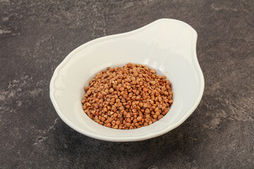Raw buсkwheat cereal in the bowl