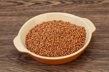 Raw buсkwheat cereal in the bowl