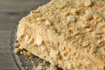 Tray with delicious Napoleon cake on gray table