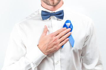 Blue ribbon cancer. Awareness prostate of health in November. Hipster men in bright shirt, cyan...