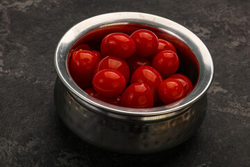 Pickled cherry tomatoes in the bowl