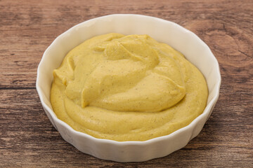 Dijon mustard sauce in the bowl