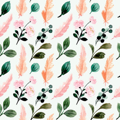 Seamless pattern with watercolor green leaves and pink feather