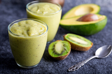 Green smoothie kiwi banana and avocado. Fresh juicy green detox smoothie.