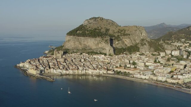 Panoramic aerial view of the ancient village of Cefalù, Sicily, Italy. Cefalù is one of the main tourist attractions of Sicily. The Rocca of Cefalu is famous and picturesque.