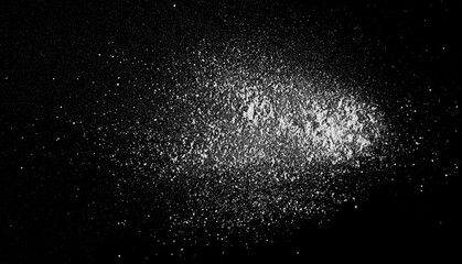 Spilled cocaine pile isolated on black background, top view