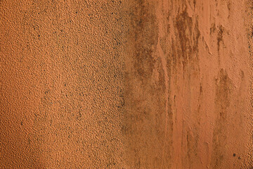 Grunge rusty metal background with texture orange-brown peeling and cracked old paint