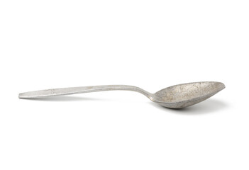 empty aluminum spoon isolated on white background