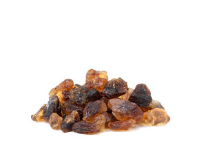pile of brown cane sugar lump isolated on white background